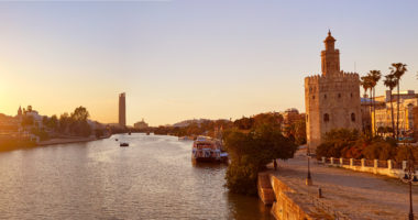 Seville sunset skyline torre del Oro in Sevilla Andalusia Spain
