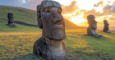 IMAGE_TYPE: wide-angle landscape photo | GENRE: adventure and exploration | EMOTION: majestic and timeless | SCENE: panoramic view of Rano Raraku volcano at sunset, casting long shadows across the Moai statues and volcanic slopes | LOCATION TYPE: Easter Island volcanic site | CAMERA MODEL: Sony Alpha 7R IV | CAMERA LENS: 16-35mm f/2.8 | SPECIAL EFFECTS: glowing sunset light, deep shadows on the statues, clear volcanic terrain | TAGS: Rano Raraku, sunset, Moai statues, volcanic beauty, Easter Island . hyper realistic, super detailed, 8K, clean, amazing, best photo, sharp photo, --chaos 50 --ar 16:9 --quality 2 --raw --stylize 500 --v 6.1 Job ID: 3bbf3ad4-dc99-4c33-acff-386aef8af72b