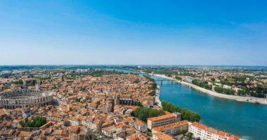 Panorama of ancient town Arles in Provence and Cote d'Azur, France, South Europe. Famous tourist destination with old Roman Artena
