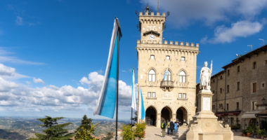 San Marino, San Marino - 14 October, 2021: view of Liberty Square and statue with the Palazzo Pubblico in the capital of San Marino